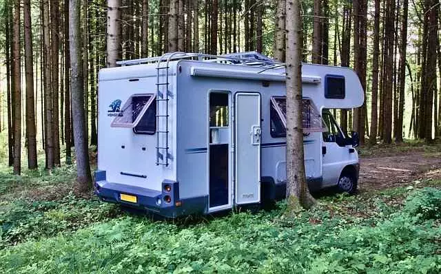 camper boondocking in the woods  rv boondocking